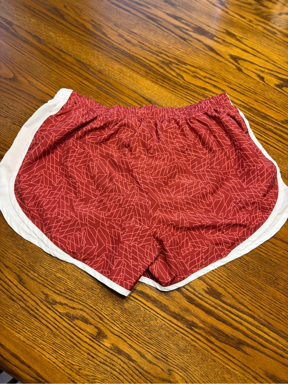 Nike Women's Red Athletic Shorts with White Trim - Picture 2 of 3